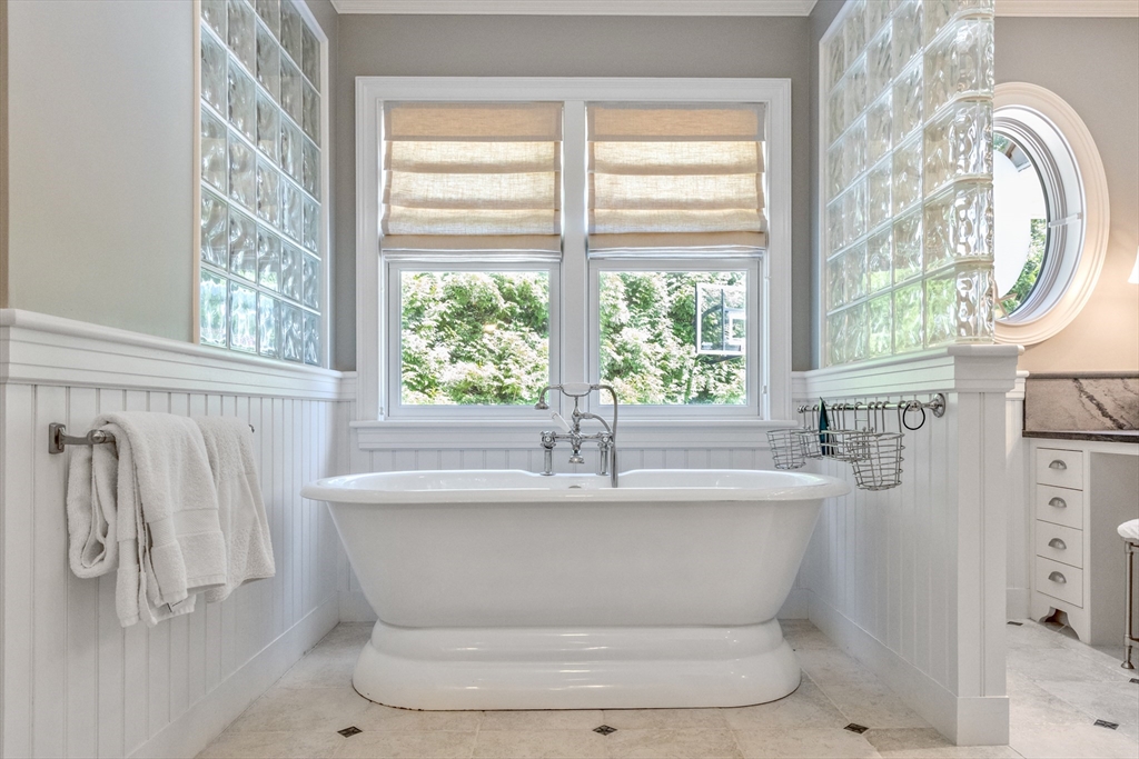 207 Pineleigh Path Barnstable, MA 02655 - Photo 32 of 42 a bathroom with a sink and a window