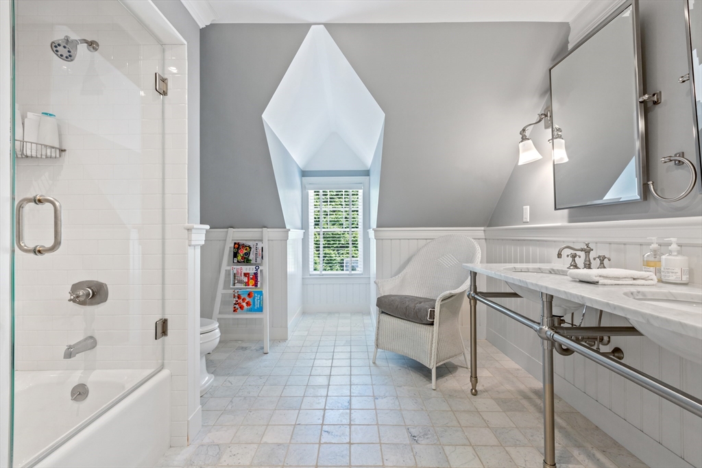 207 Pineleigh Path Barnstable, MA 02655 - Photo 36 of 42 a bathroom with a tub sink and a mirror