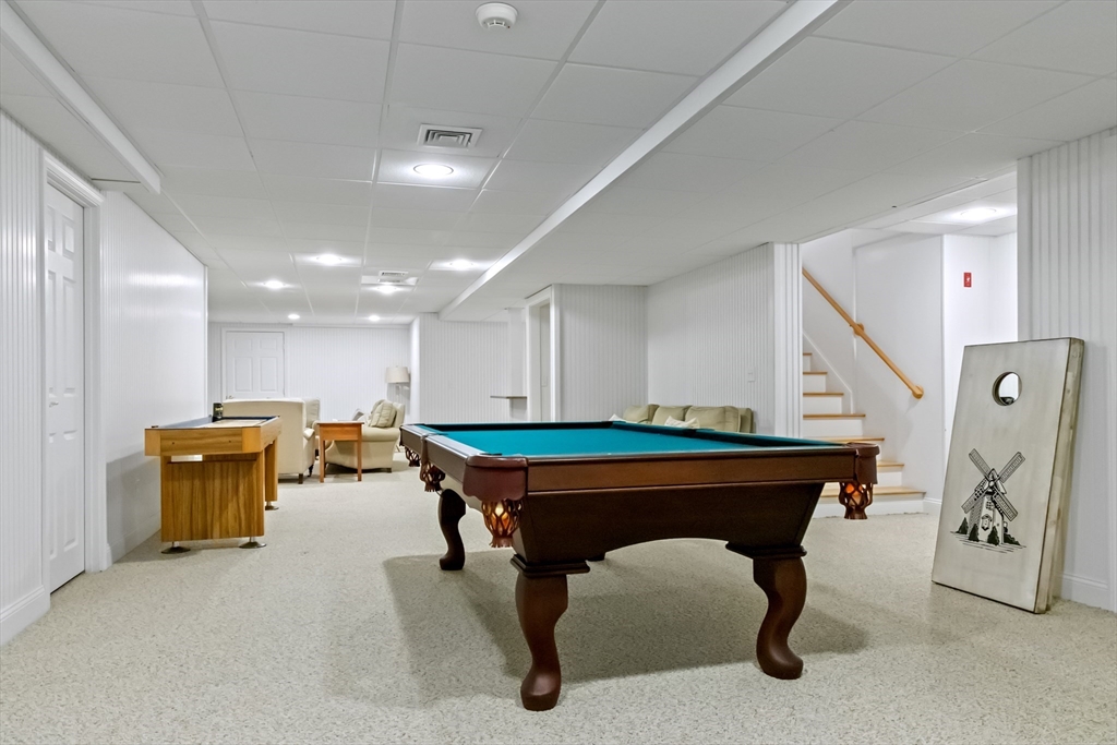 207 Pineleigh Path Barnstable, MA 02655 - Photo 40 of 42 a room with furniture pool table and windows