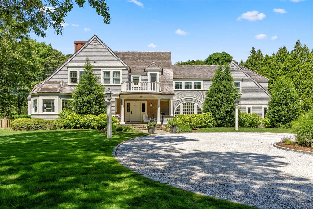 207 Pineleigh Path Barnstable, MA 02655 - Photo 5 of 42 a front view of a house with a yard