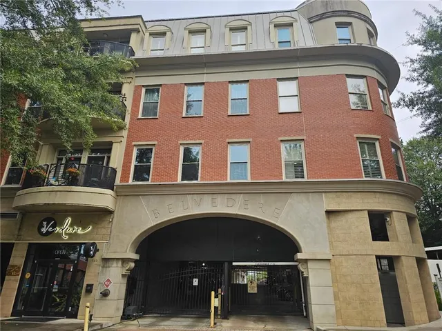 a front view of a building with balcony