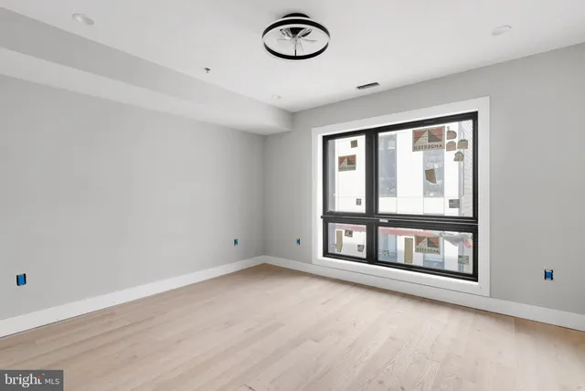 an empty room with window