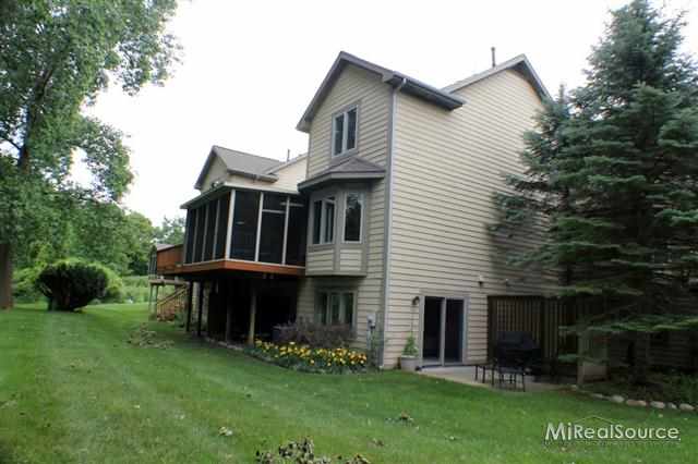 6602 Steeple Ridge, Unit 18 Clarkston, MI 48346 - Photo 20 of 21 Exterior back