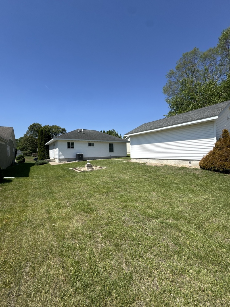 354 19th Place Clinton, IA 52732 - Photo 12 of 16 a view of a field with an outdoor space