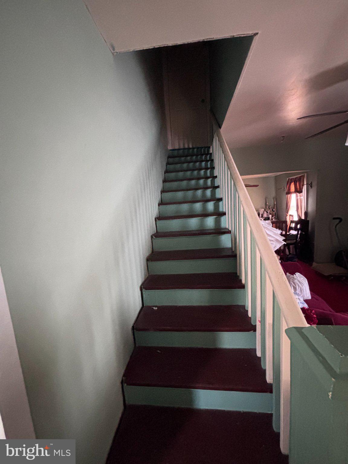 810 Locust Street Cambridge, MD 21613 - Photo 17 of 19 Inviting staircase to new beginnings.