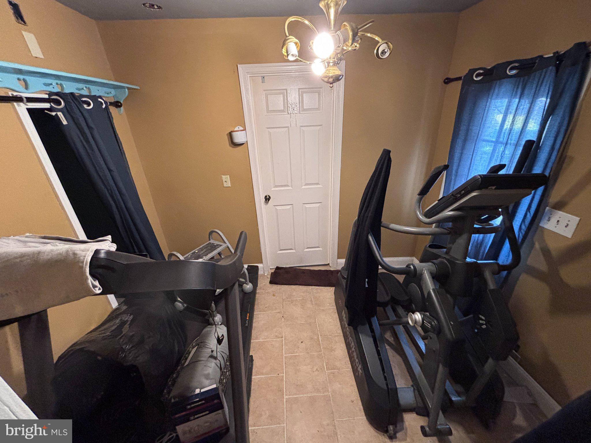 810 Locust Street Cambridge, MD 21613 - Photo 7 of 19 Cozy fitness nook with natural light.
