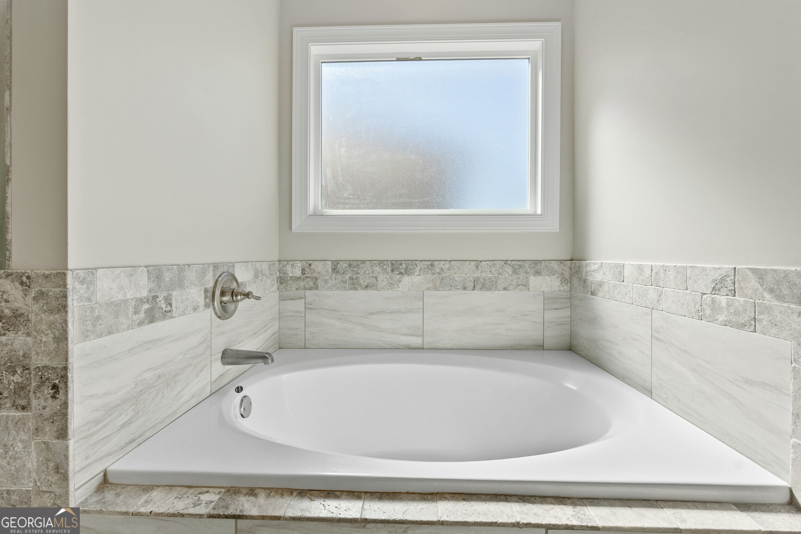 1101 Adirondac Way Bonaire, GA 31005 - Photo 19 of 31 a white bath tub sitting in a bathroom