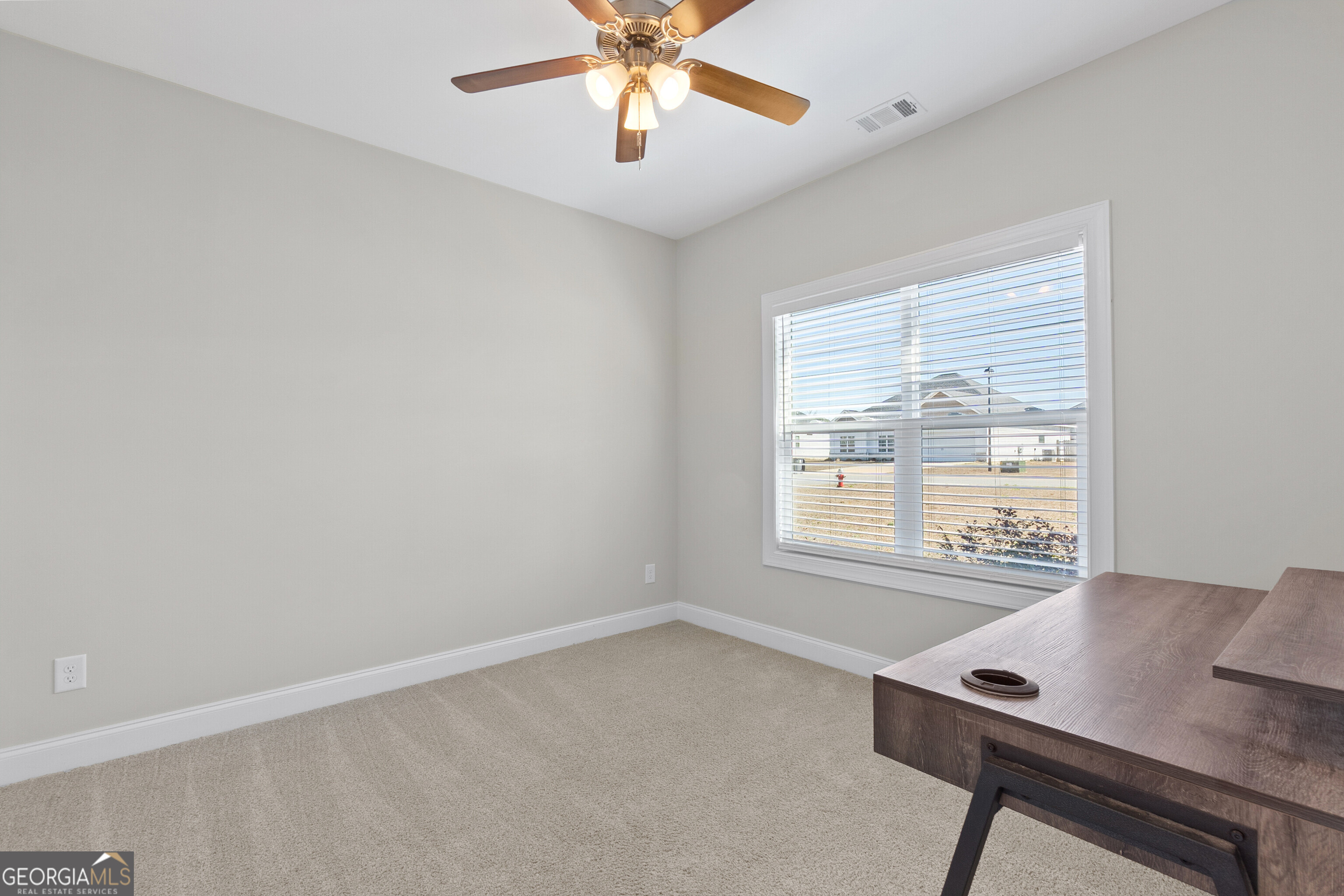 1101 Adirondac Way Bonaire, GA 31005 - Photo 24 of 31 a workspace with a window and a table