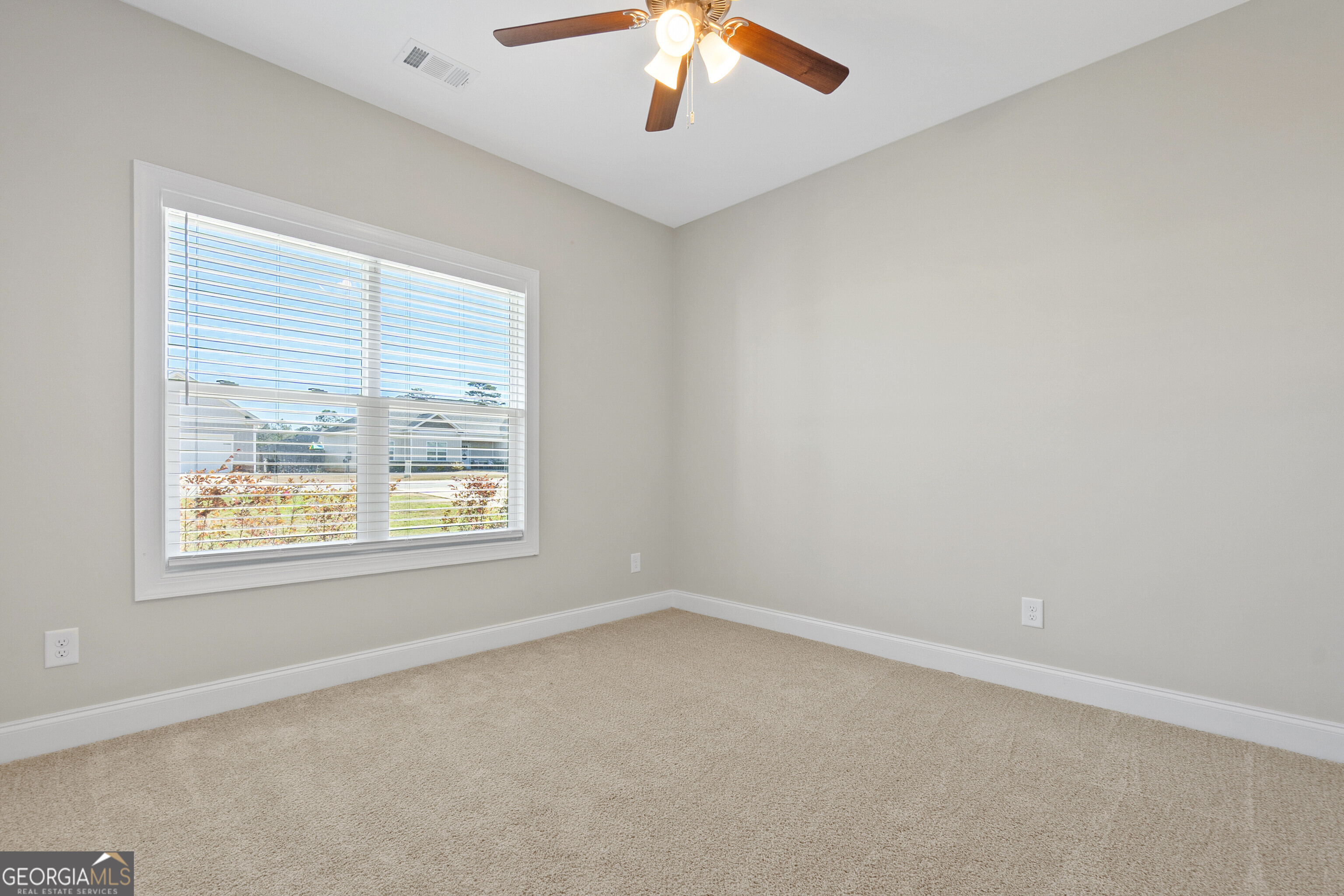 1101 Adirondac Way Bonaire, GA 31005 - Photo 27 of 31 an empty room with a window