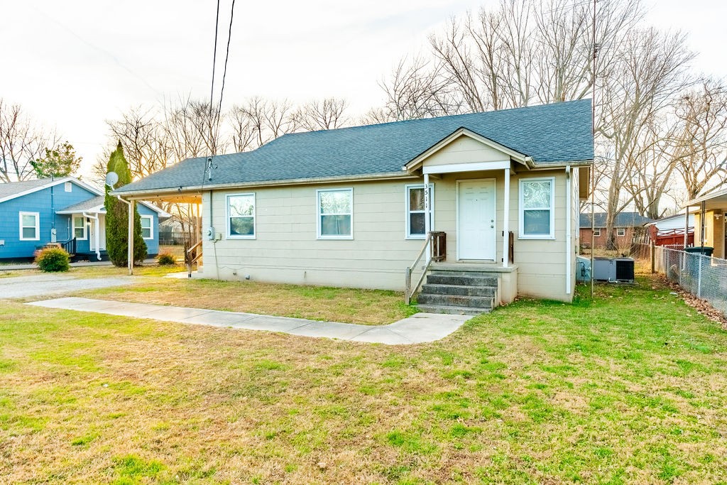 3511 Lafayette Road Hopkinsville, KY 42240 - Photo 16 of 19 a view of a house with a swimming pool and a chairs