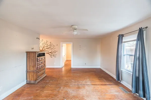 a view of an empty room and window