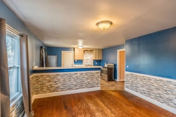 a view of hallway with livingroom