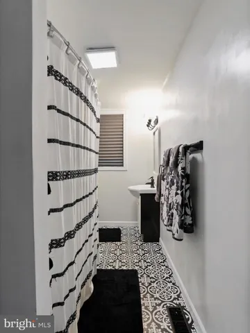 a view of entryway with stairs and bedroom