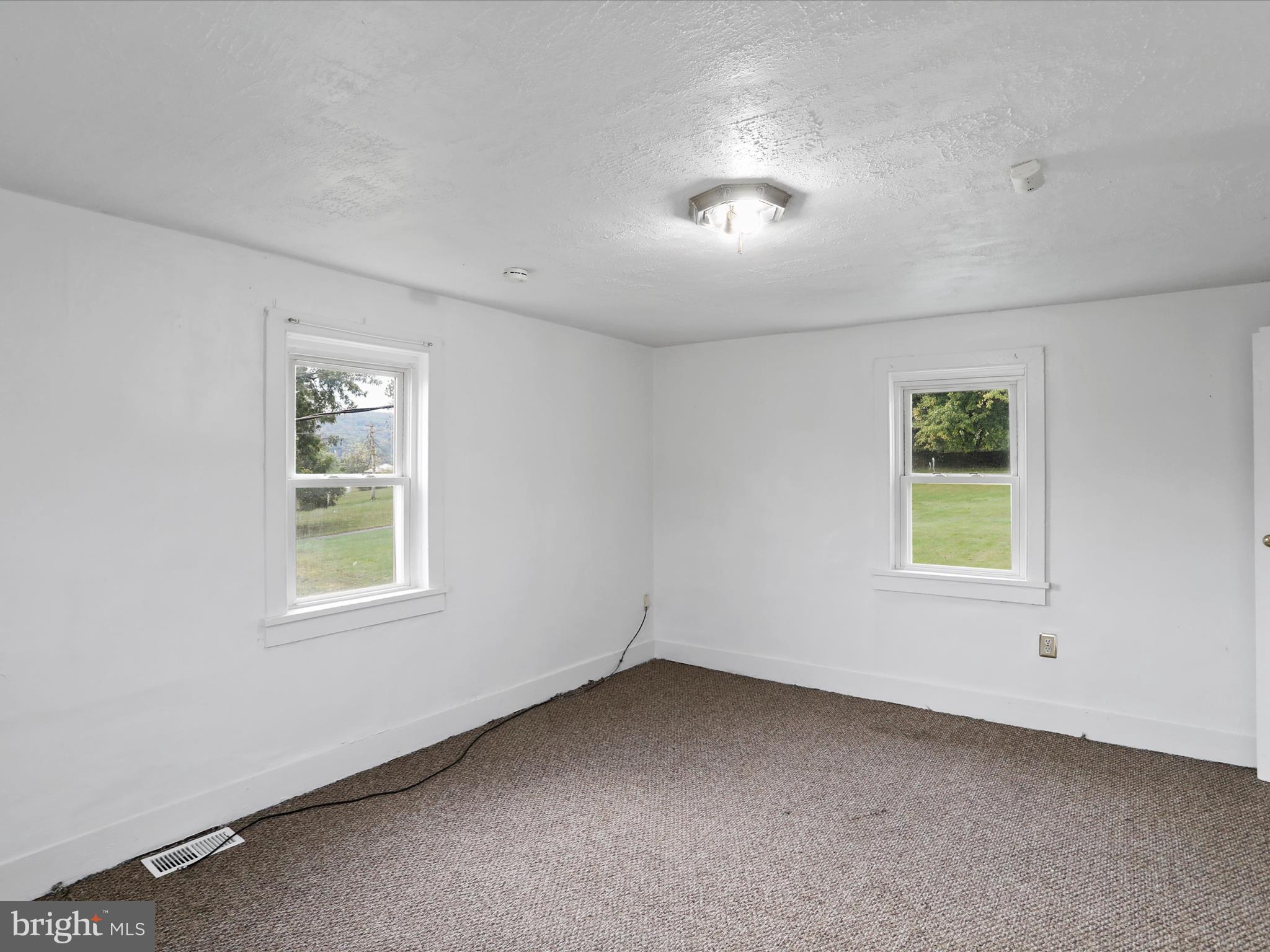 16112 Calla Hill Road Northwest Mount Savage, MD 21545 - Photo 18 of 27 an empty room with a window