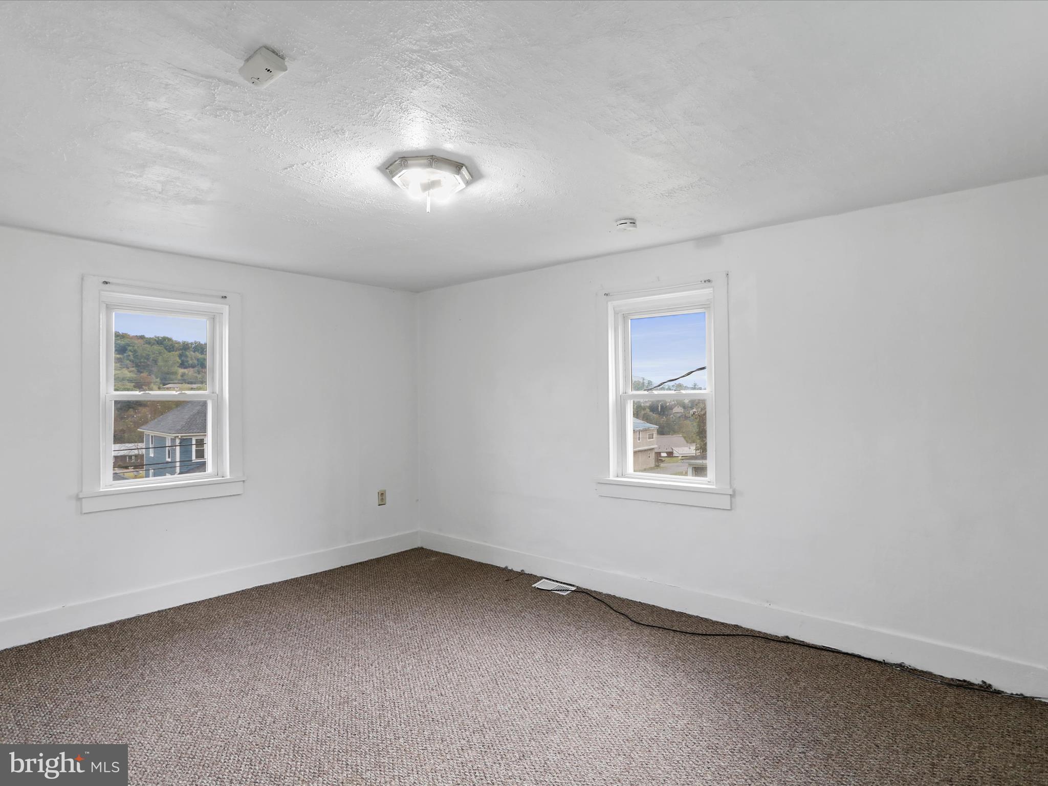 16112 Calla Hill Road Northwest Mount Savage, MD 21545 - Photo 21 of 27 an empty room with a window
