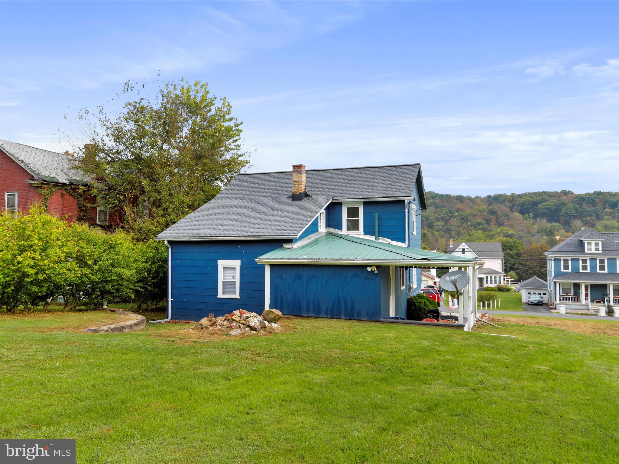 16112 Calla Hill Road Northwest Mount Savage, MD 21545 - Photo 24 of 27 a front view of a house with a garden and plants