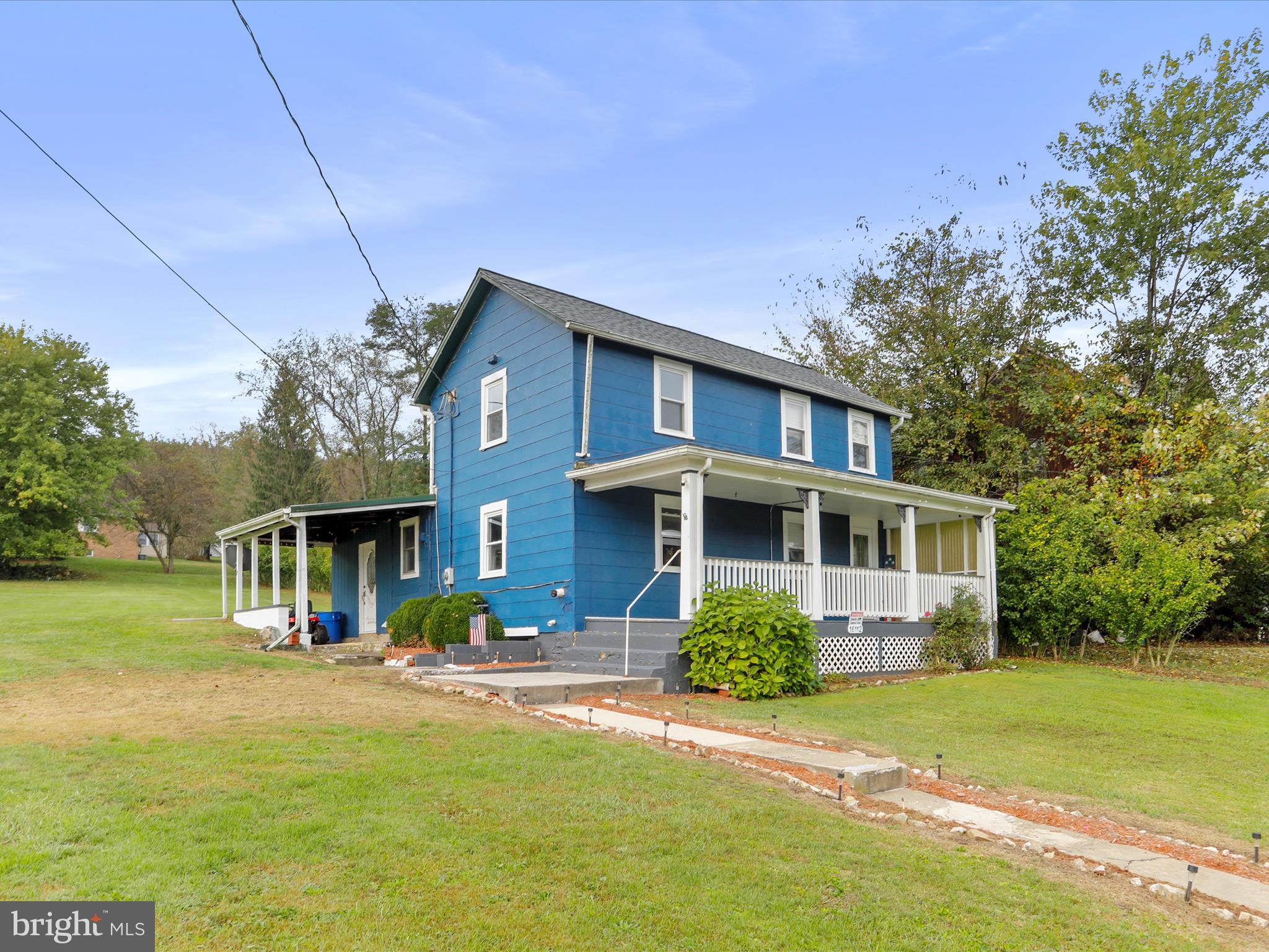 16112 Calla Hill Road Northwest Mount Savage, MD 21545 - Photo 3 of 27 a front view of a house with garden