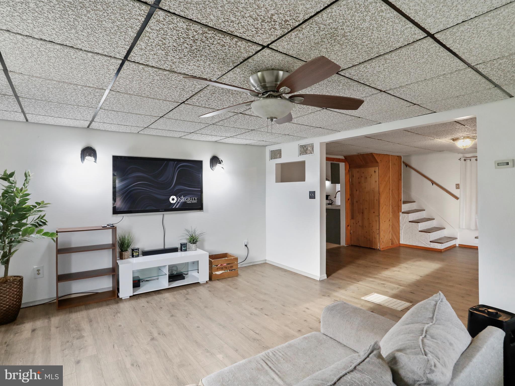 16112 Calla Hill Road Northwest Mount Savage, MD 21545 - Photo 6 of 27 a living room with furniture and a flat screen tv
