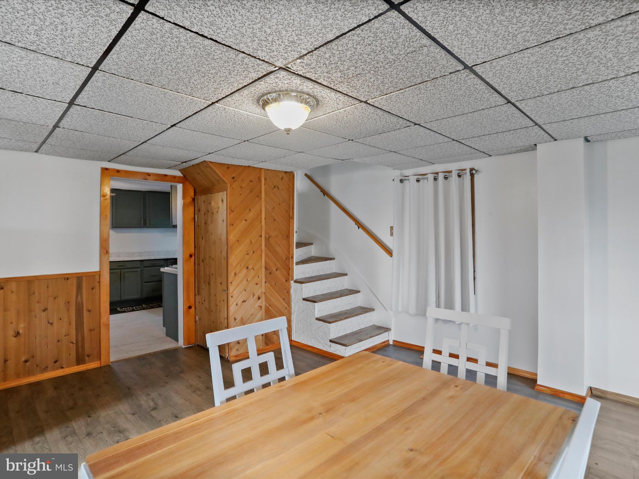 16112 Calla Hill Road Northwest Mount Savage, MD 21545 - Photo 9 of 27 a view of a livingroom with wooden floor and stairs