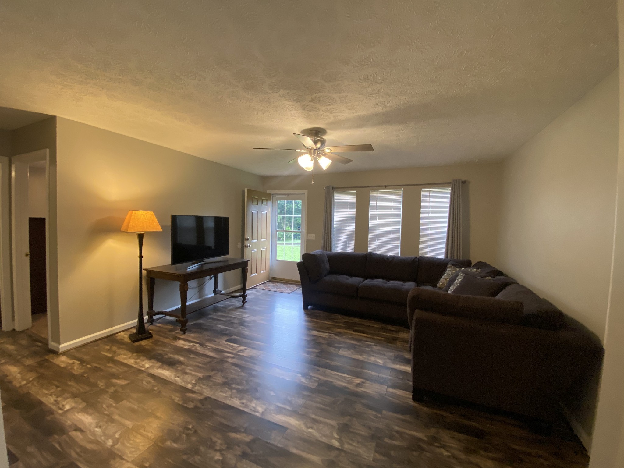 3925 Beasleys Bend Road Lebanon, TN 37087 - Photo 2 of 4 a living room with furniture and a flat screen tv