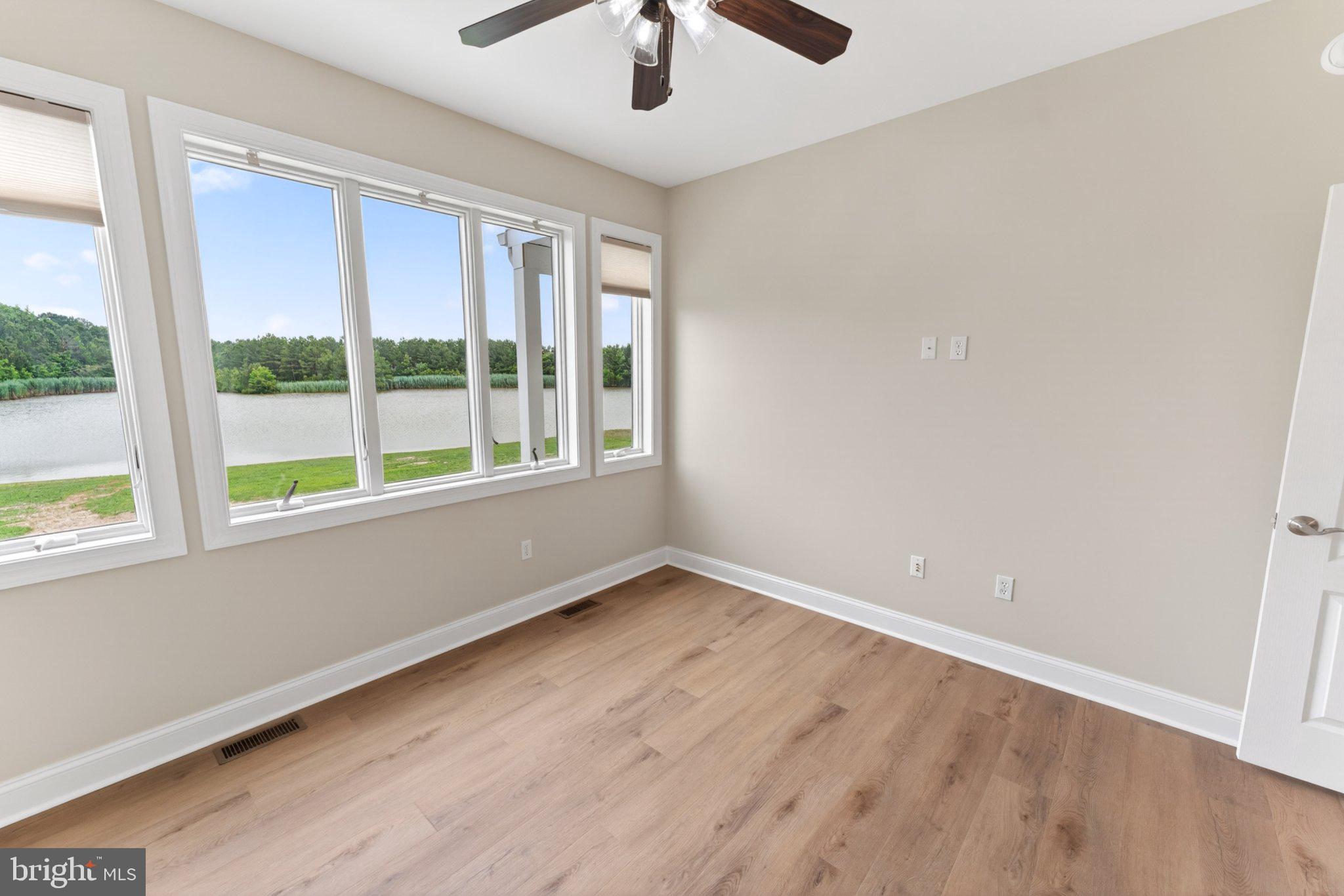 34029 Peppers Corner Road Millville, DE 19967 - Photo 24 of 101 Bright and airy room with scenic views.