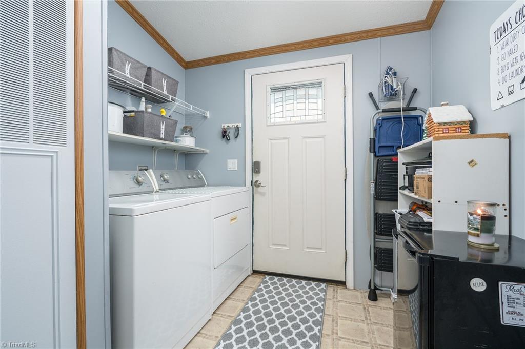 182 Jenkins Road Lexington, NC 27295 - Photo 29 of 44 Laundry Room/Back Door Entrance