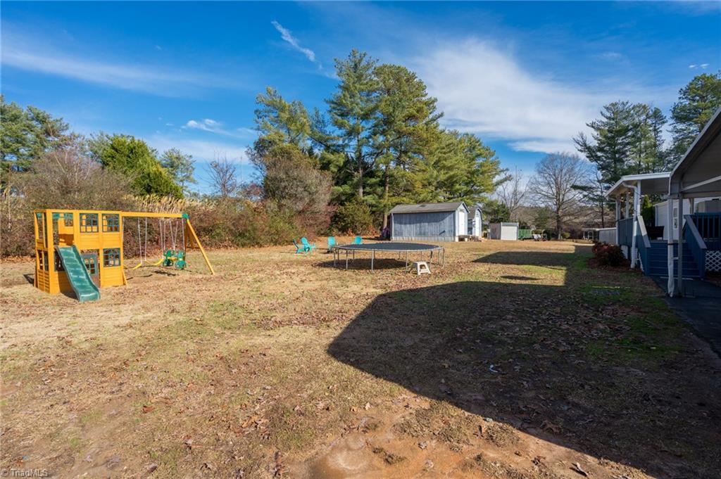 182 Jenkins Road Lexington, NC 27295 - Photo 33 of 44 Back Yard/Storage Buildings