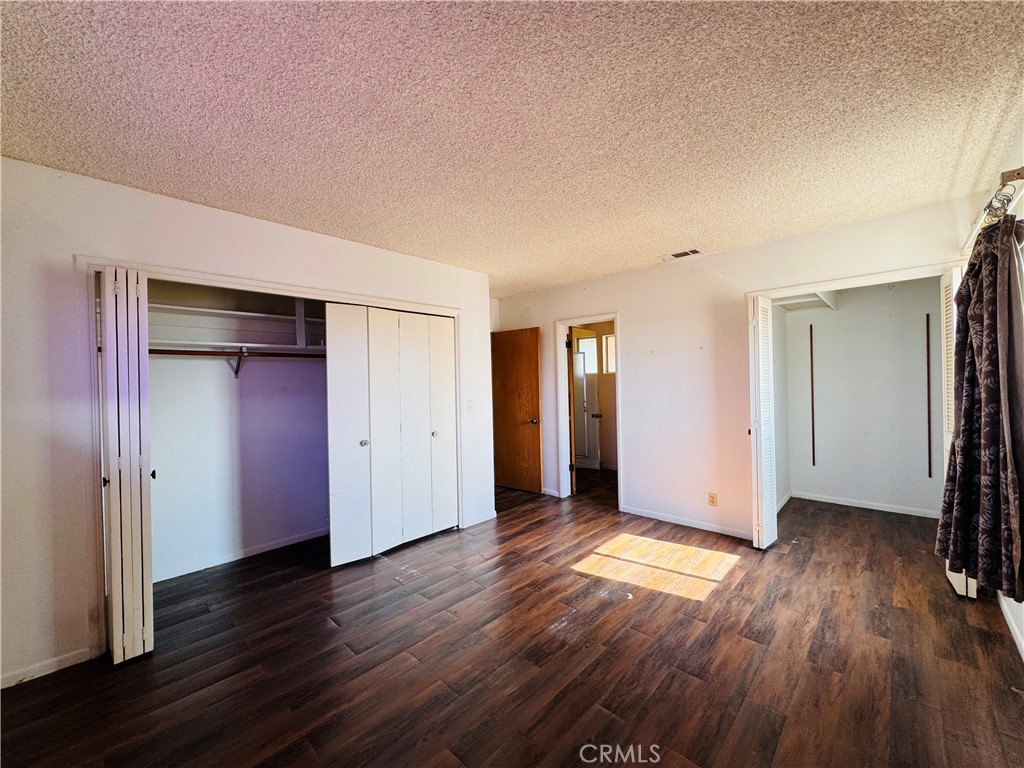 12257 Skywood Court Riverside, CA 92503 - Photo 37 of 47 Primary Bedroom w/ two closets and bathroom