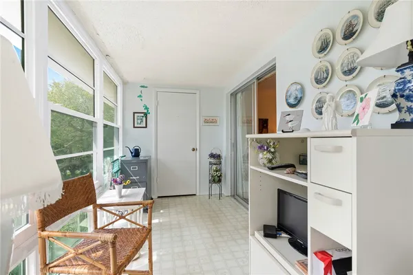 a view of a livingroom with furniture and front door