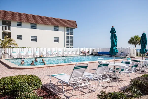 a view of a house with a swimming pool