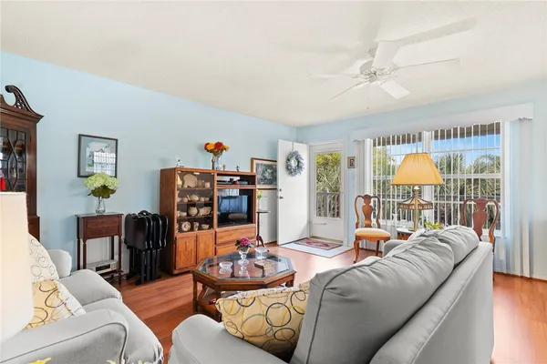 a living room with furniture and a table