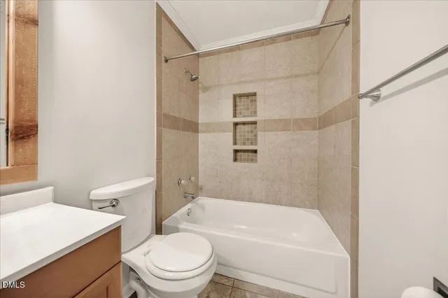 an empty room with closet area