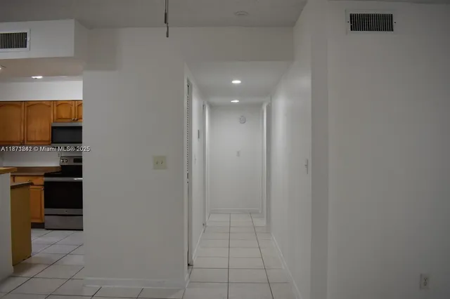 a view of a kitchen with a sink