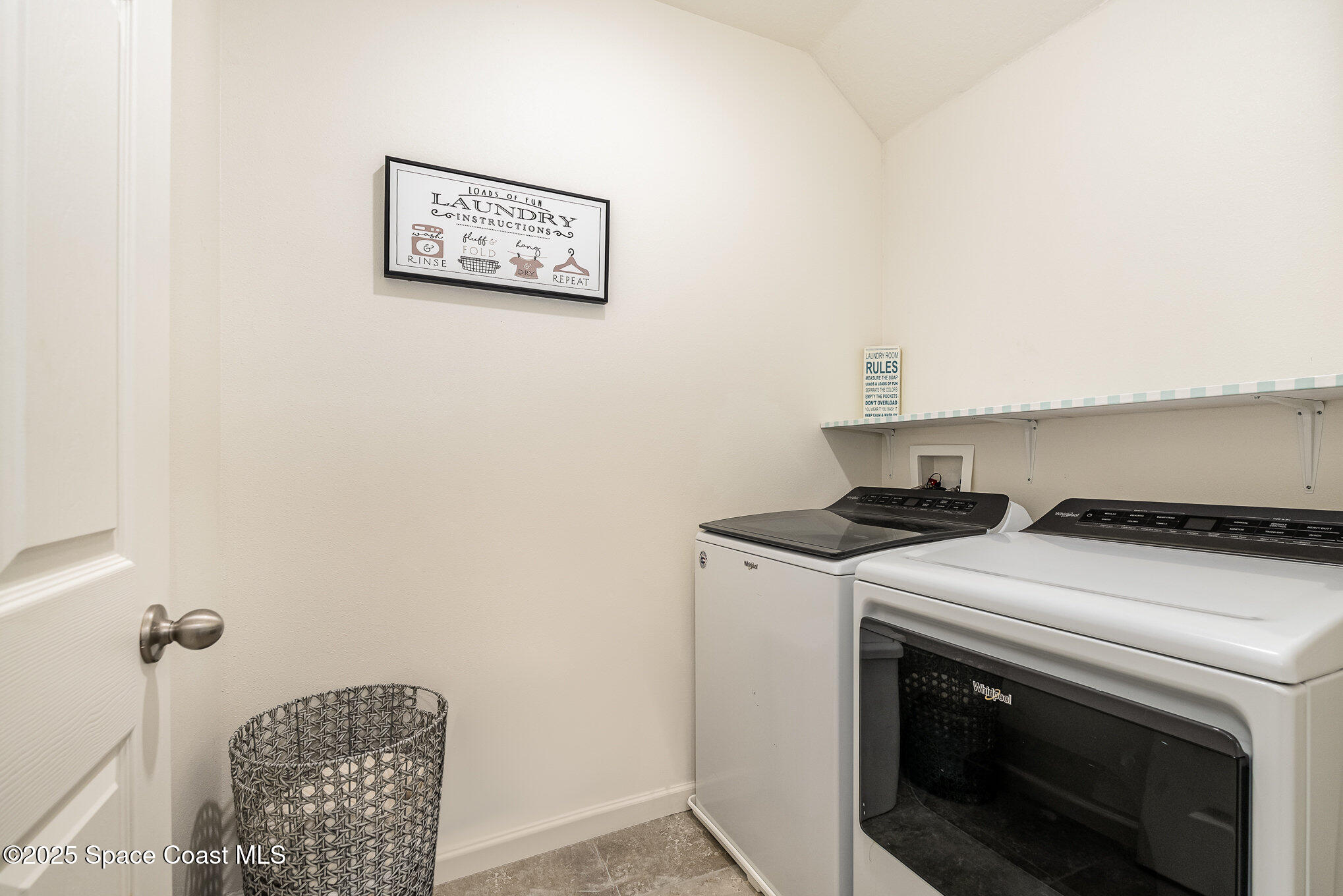 735 Sorrento Drive Cocoa, FL 32922 - Photo 18 of 23 a view of washer and dryer