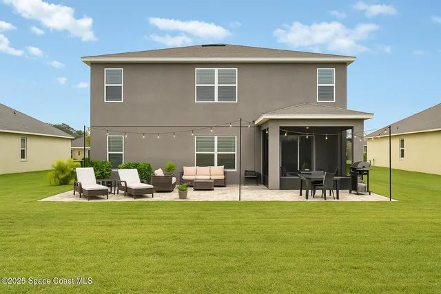 a view of a house with patio
