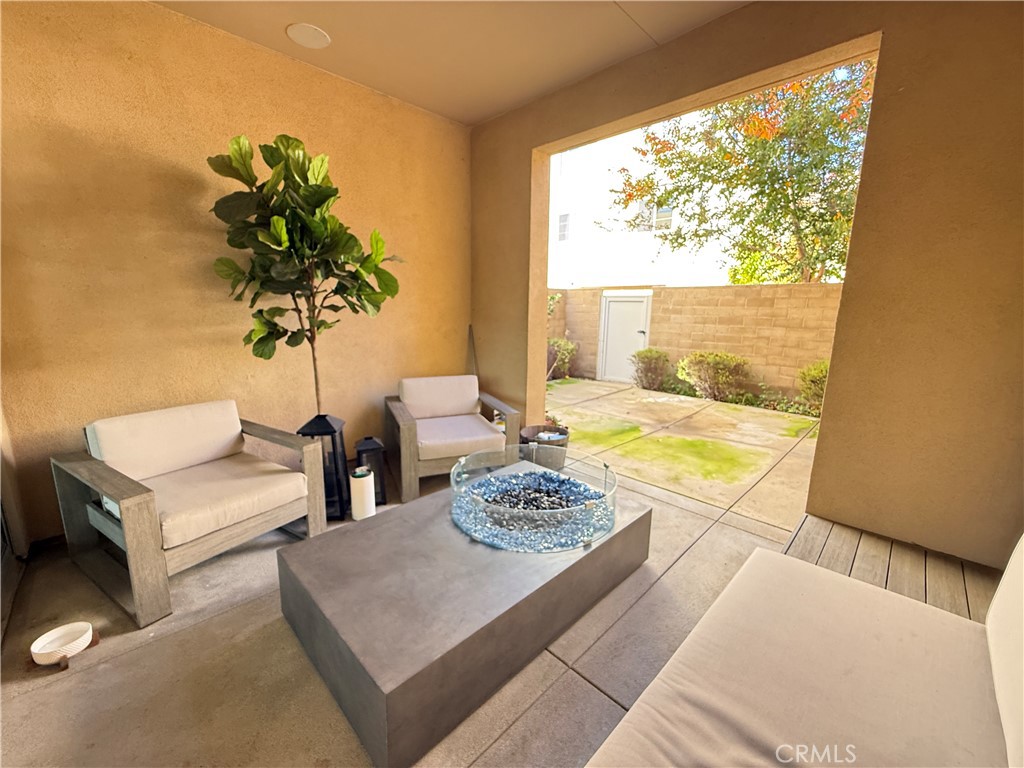 101 Interval Irvine, CA 92618 - Photo 18 of 20 a living room with furniture and a large window