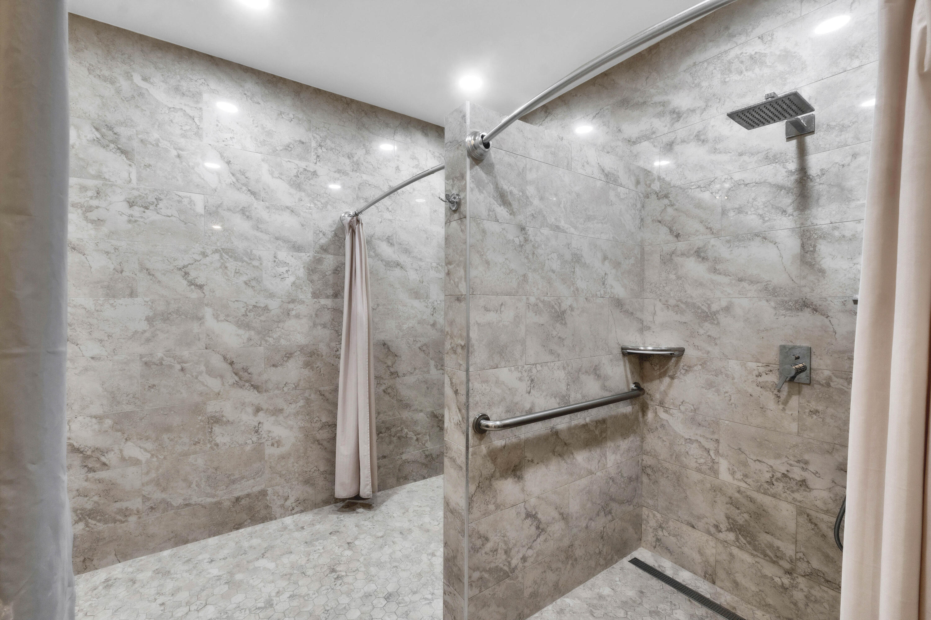 301 Cambridge Road, Unit 202 Hollywood, FL 33024 - Photo 36 of 38 Clubhouse Bathroom Showers