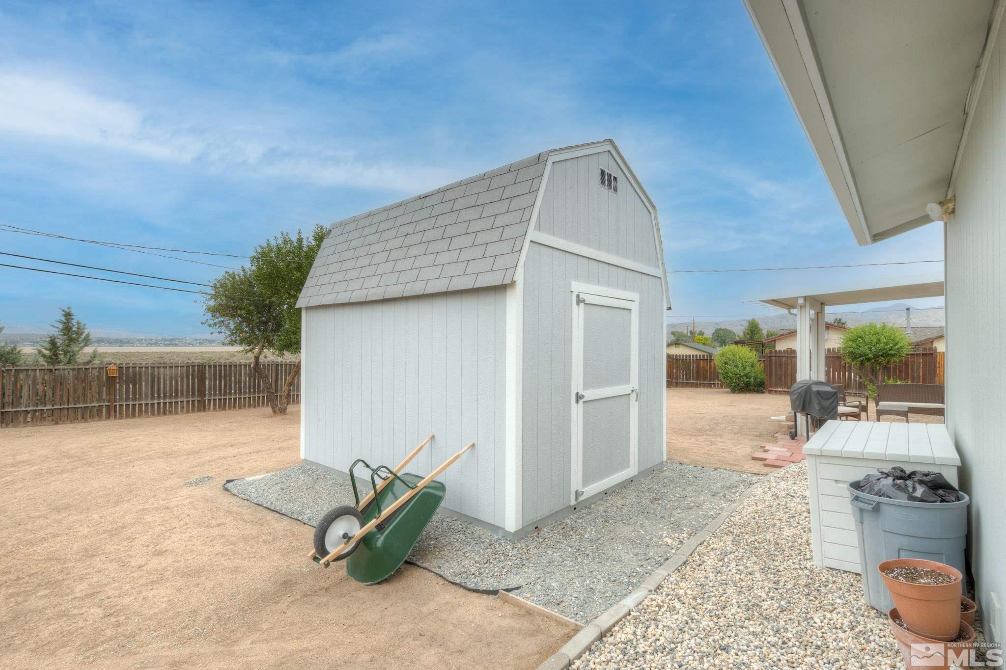 3360 Canvasback Lane Reno, NV 89508 - Photo 29 of 35 a view of a house with backyard and sitting area