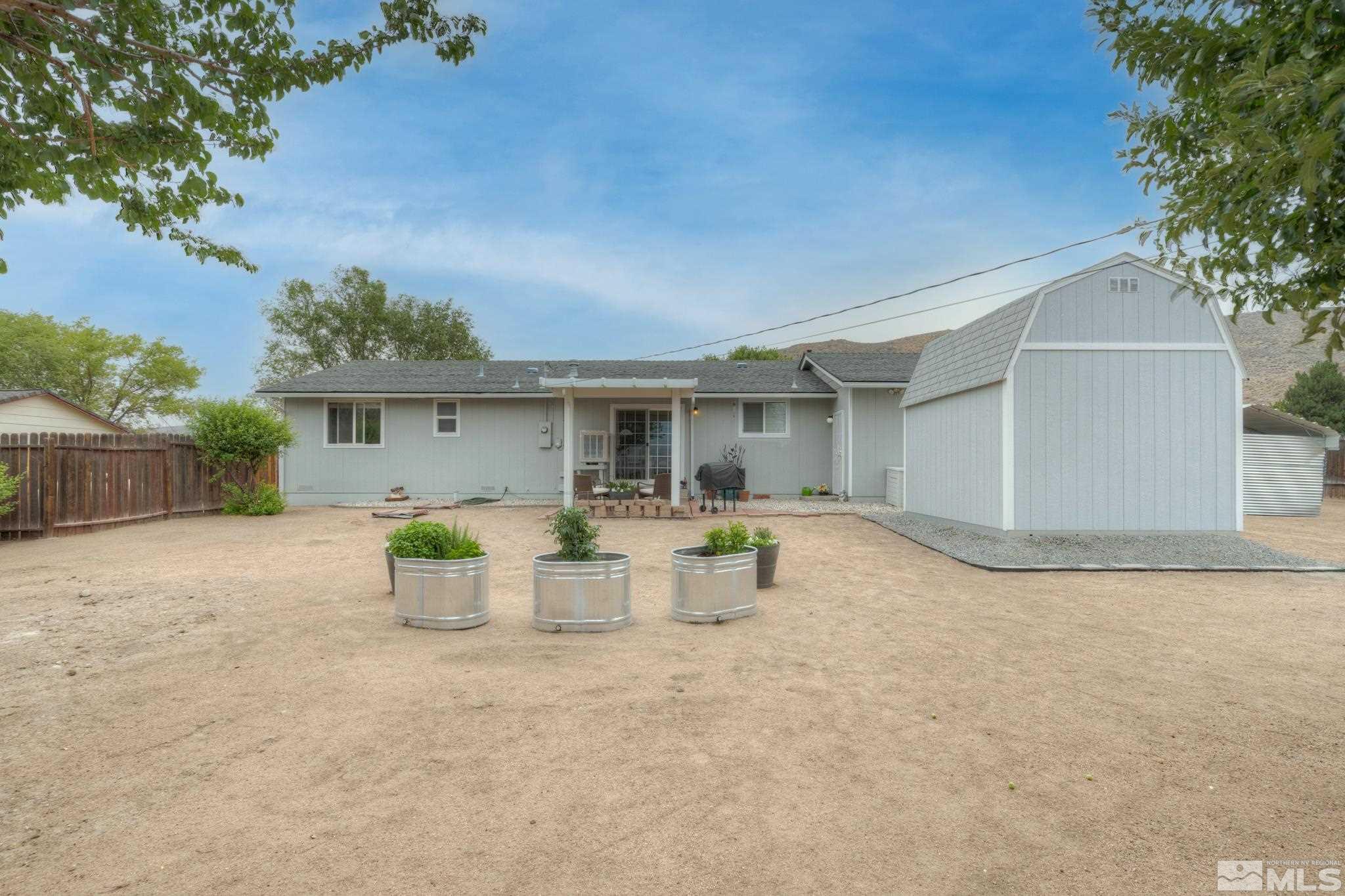 3360 Canvasback Lane Reno, NV 89508 - Photo 31 of 35 a view of a house with backyard and sitting area