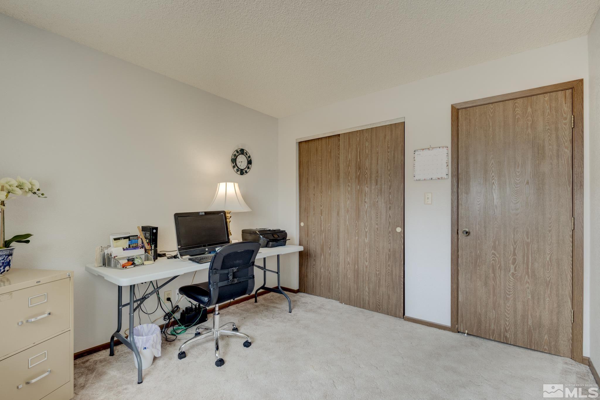 3360 Canvasback Lane Reno, NV 89508 - Photo 7 of 35 a view of a workspace with furniture
