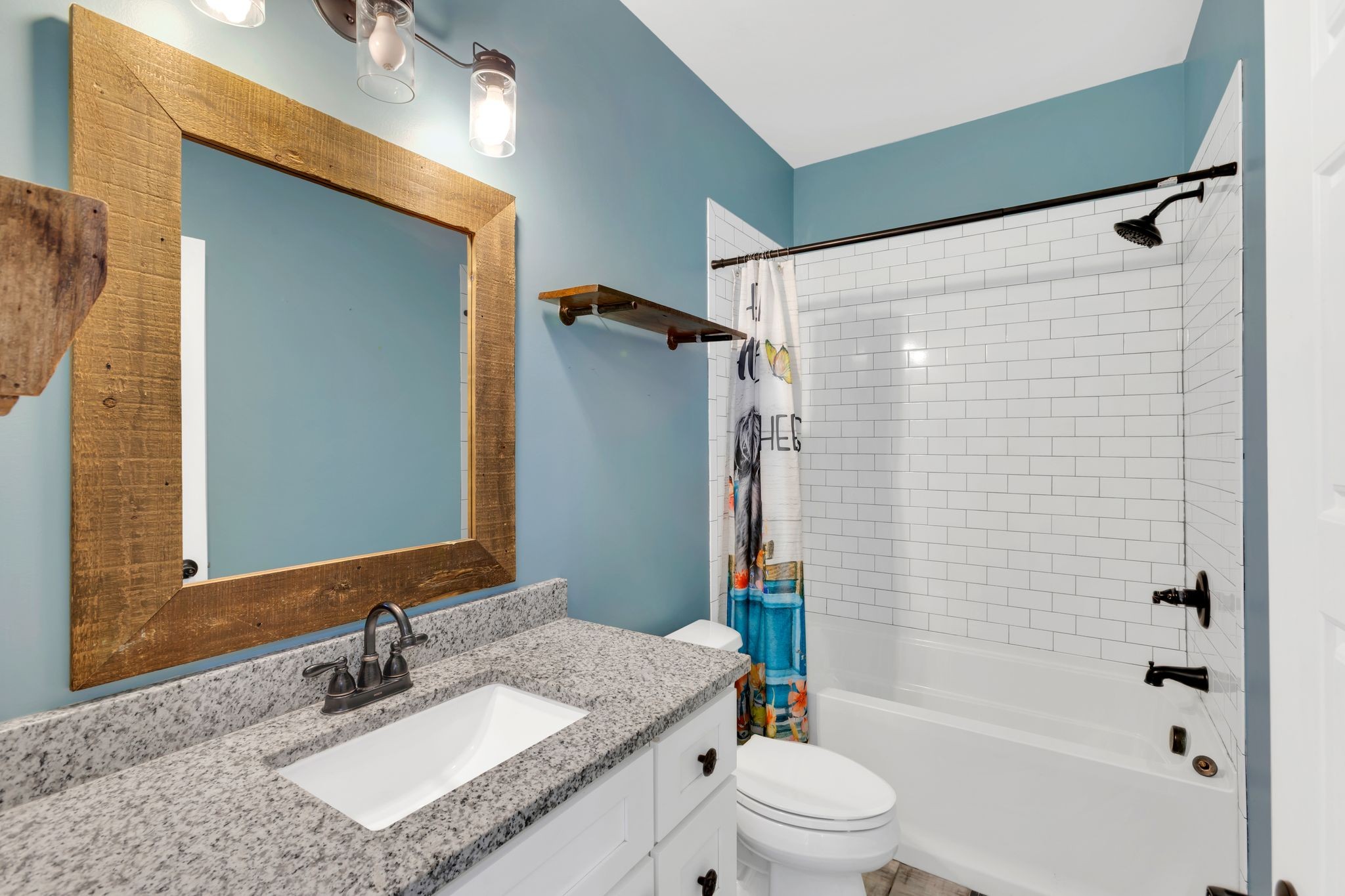 229 Pleasant View Road White Bluff, TN 37187 - Photo 25 of 38 a bathroom with a granite countertop sink toilet and shower