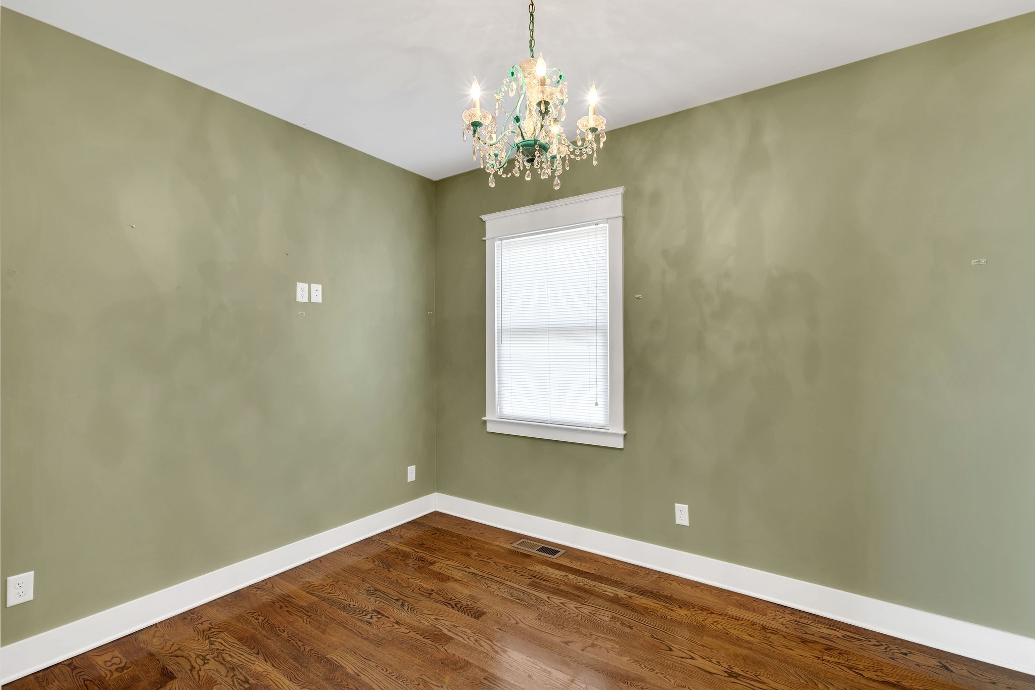 229 Pleasant View Road White Bluff, TN 37187 - Photo 26 of 38 a view of a room with wooden floor and chandelier