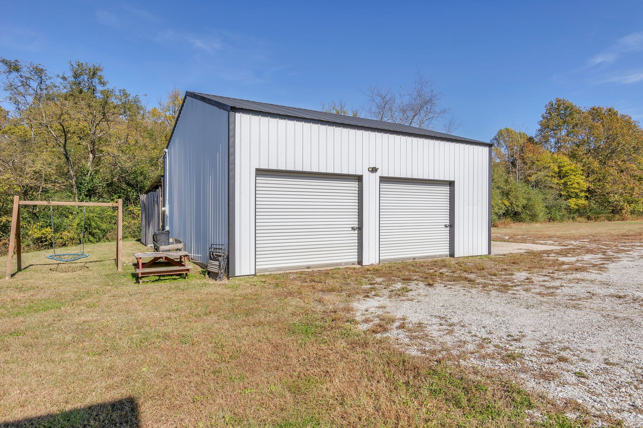 229 Pleasant View Road White Bluff, TN 37187 - Photo 3 of 38 a view of a house with backyard and parking space