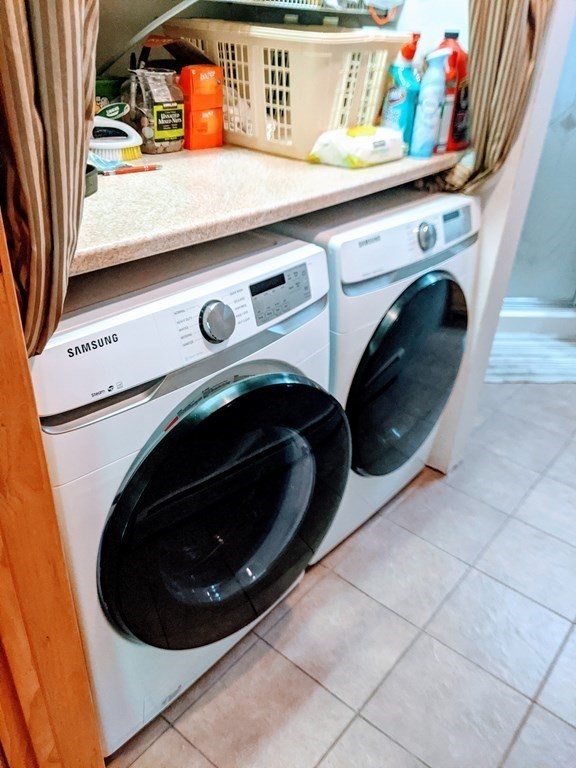 9 Byron Street Wakefield, MA 01880 - Photo 14 of 42 a utility room with dryer and washer