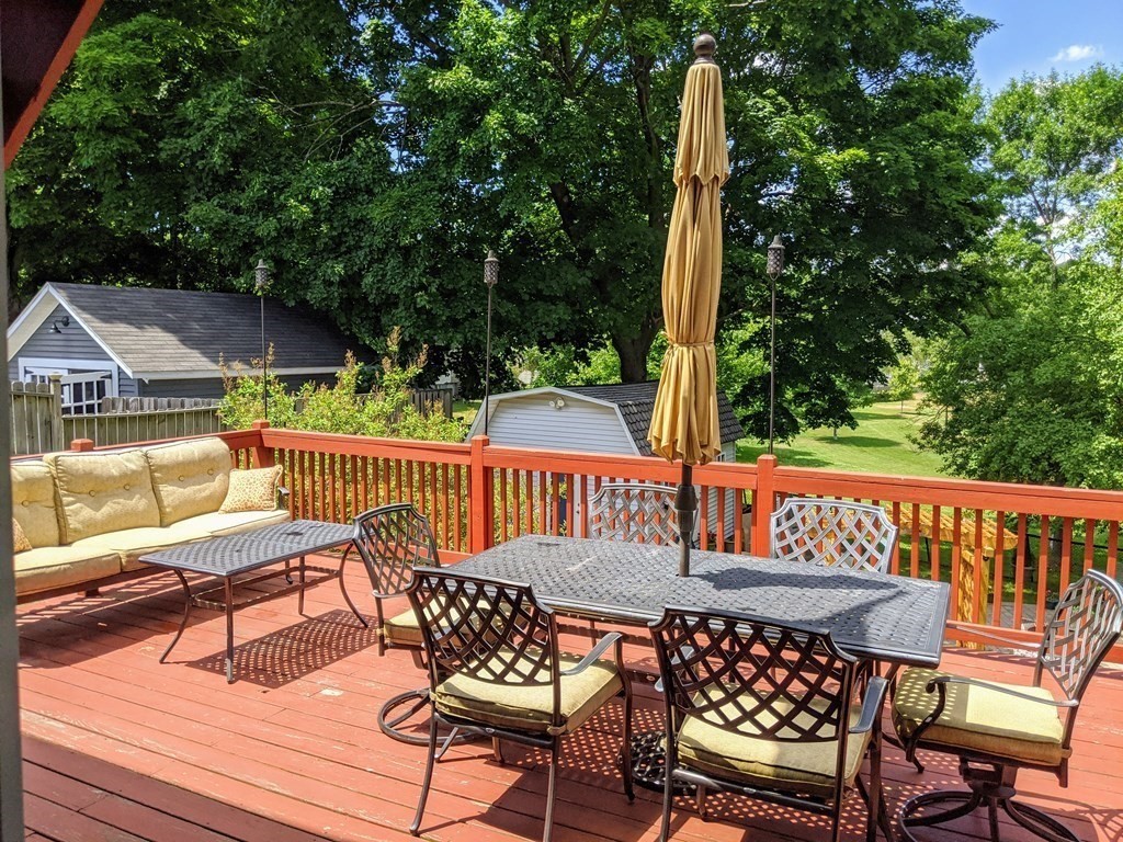 9 Byron Street Wakefield, MA 01880 - Photo 16 of 42 a view of a patio with a table and chairs