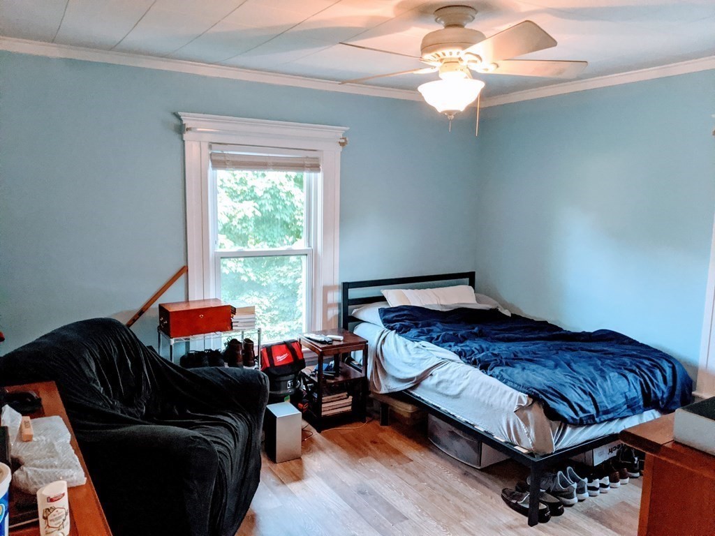 9 Byron Street Wakefield, MA 01880 - Photo 18 of 42 a bedroom with bed and window