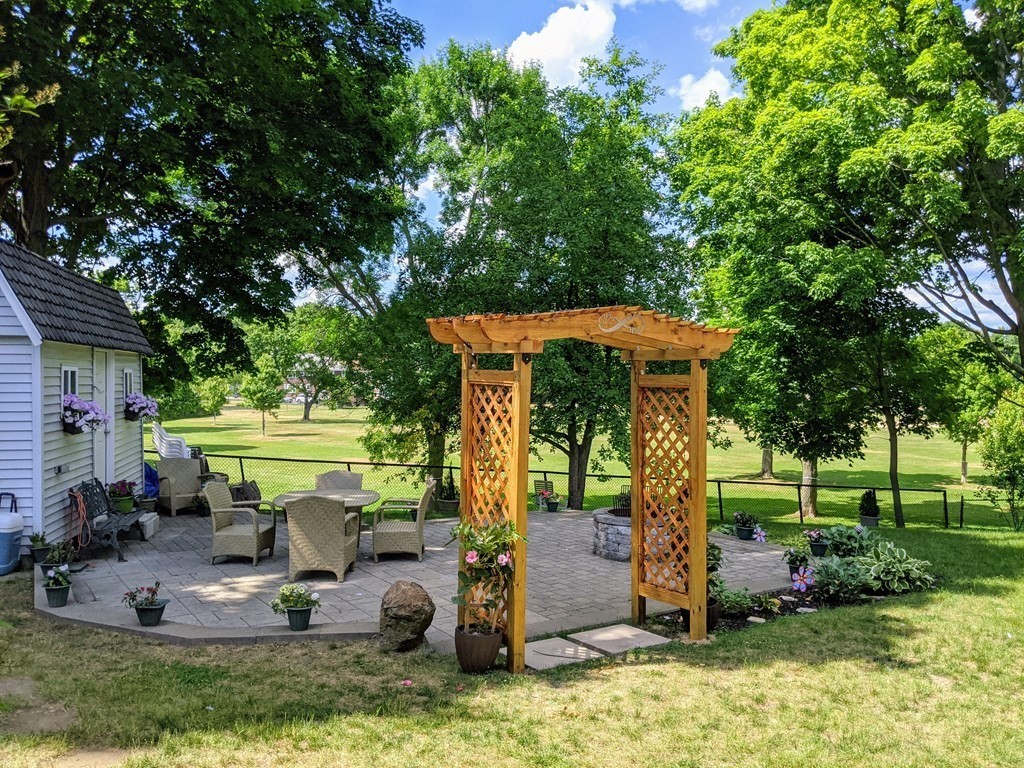 9 Byron Street Wakefield, MA 01880 - Photo 30 of 42 a view of a swimming pool with a patio