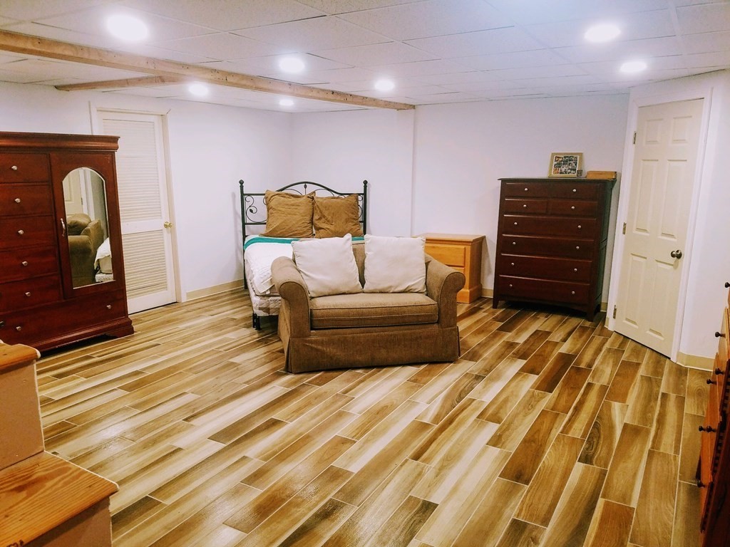 9 Byron Street Wakefield, MA 01880 - Photo 40 of 42 a bedroom with a bed and furniture