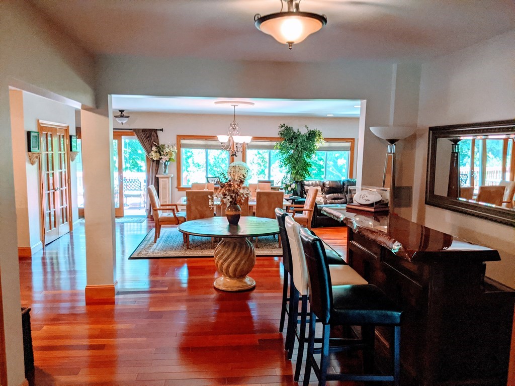 9 Byron Street Wakefield, MA 01880 - Photo 4 of 42 a view of a dining room with furniture window and wooden floor