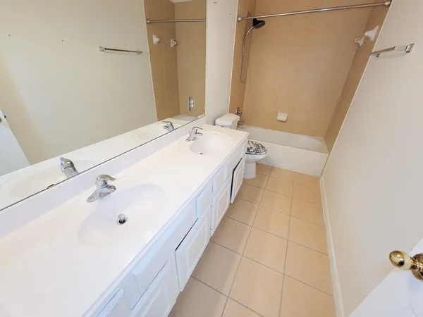 a bathroom with a bathtub and a sink